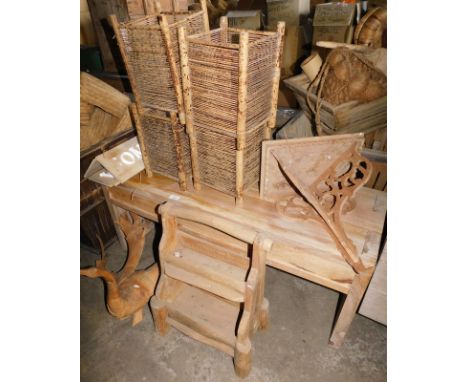 A reclaimed teak coffee table, 45cm high, the top 104cm x 46cm, a driftwood carving of a bird, an Eastern hardwood hanging co