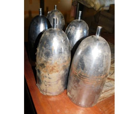 Five hammered metal light shades, of cylindrical elongated form, with copper coloured interior, 29cm high.  Note: VAT is paya