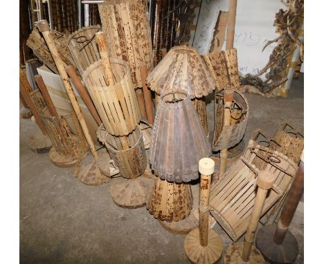 A large quantity of tiger bamboo light shades, table lamp bases, etc., various styles.  Note: VAT is payable on the hammer pr