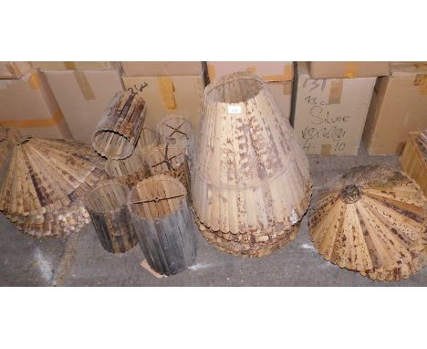 A quantity of tiger bamboo light shades, various sizes and styles.  Note: VAT is payable on the hammer price of this lot at 2