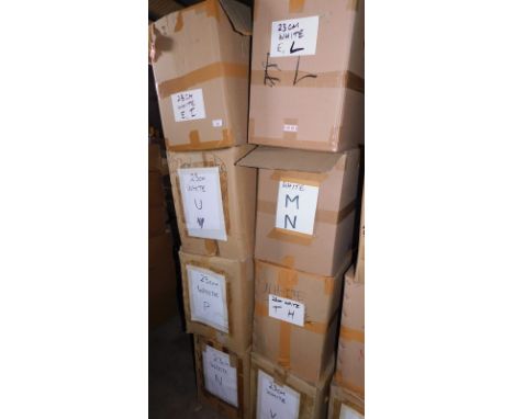A group of white painted carved wooden letters, to include M, N, E, L, P, each 23cm high. (a quantity)  Note: VAT is payable 