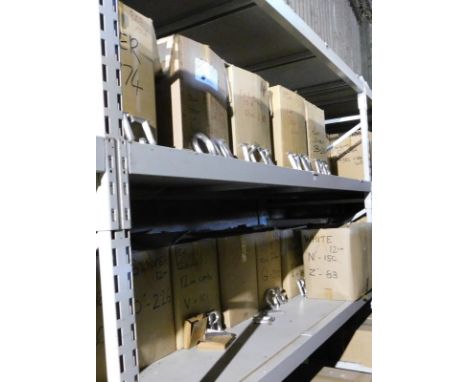A group of silver coloured carved wooden letters, to include J, K, W, G, each 12cm high. (2 shelves) Note: VAT is payable on 
