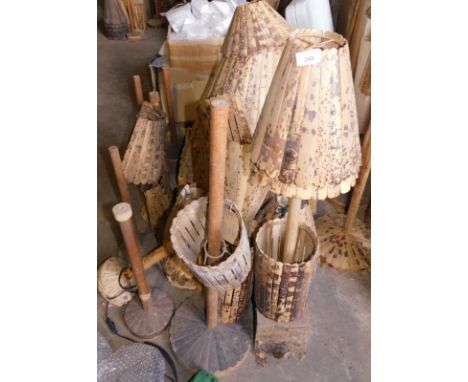 A large quantity of tiger bamboo light shades, table lamp bases, etc., various styles.  Note: VAT is payable on the hammer pr