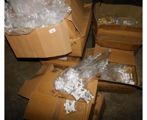 A group of white painted carved letters, to include H, E, B, M, etc., each 7cm high. (a quantity)  Note: VAT is payable on th