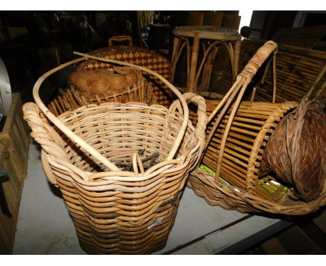 A group of wicker items, to include a two handled log basket, 40cm high, flower basket, 43cm high, bamboo stool, picnic hampe