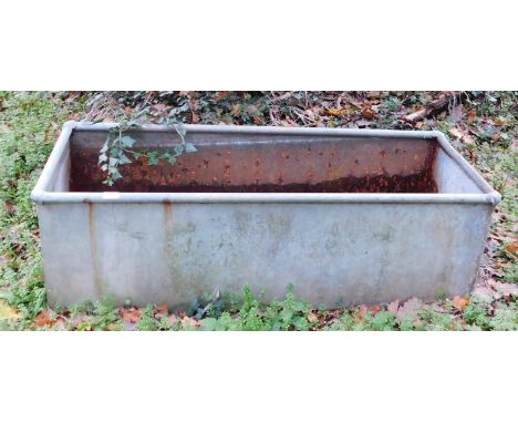 A galvernised water trough, circa 5'. Note: VAT is payable on the hammer price of this lot at 20%. 