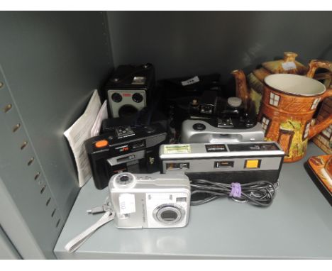 A selection of vintage cameras and photography equipment