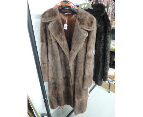 A vintage ladies long fur coat 
