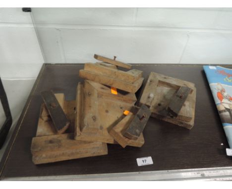 A selection of vintage picture framing clamps