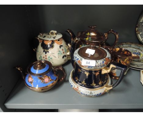 A selection of vintage lustre effect tea pots and similar 