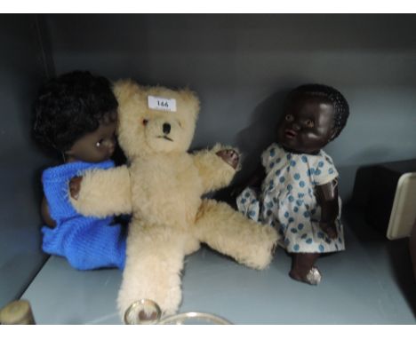 A selection of vintage childs dolls and teddy bear