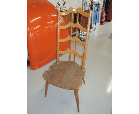 An early utility chair by Ercol with beech frame and elm seat