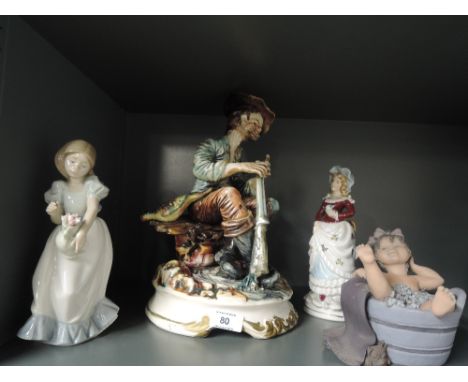 A selection of vintage figures and figurines