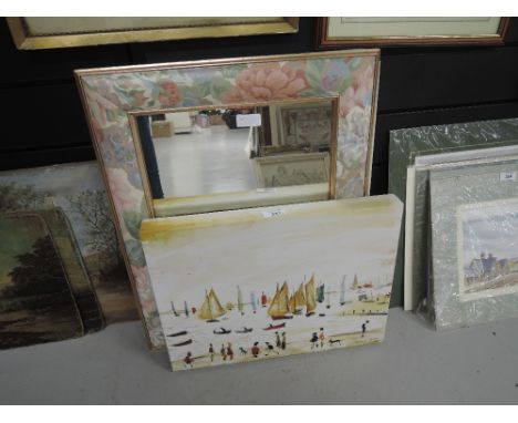 A selection of vintage prints and mirror