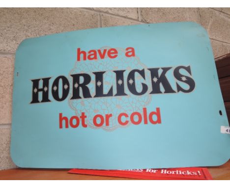 A vintage advertising light up stand for Horlicks