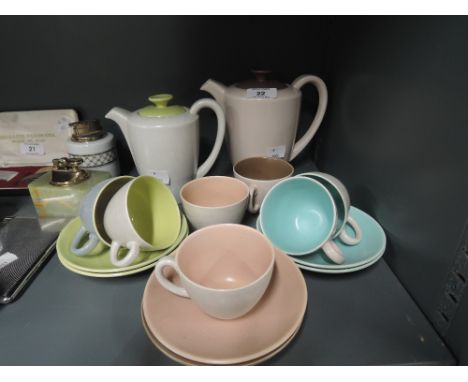 A vintage part tea or coffee service by Poole in the classic two tone design