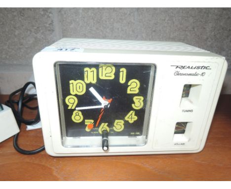 A vintage 1970's style radio and alarm clock by Realistic