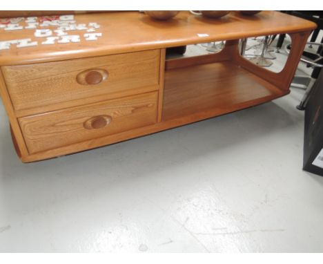 An Ercol coffee table of television stand with integral drawers in light stainEXCELLENT CONDITION