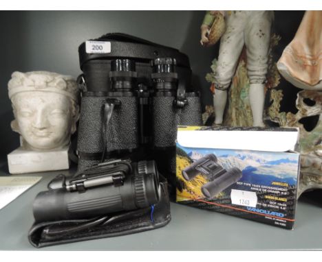 A selection of vintage binoculars including Omiya