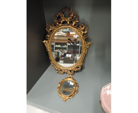 Two vintage wall mirrors with plaster effect frames