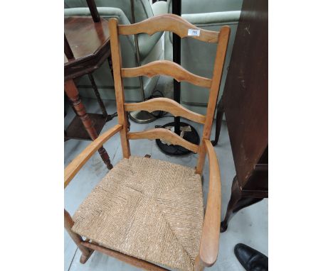 A traditional ladder back rocking chair