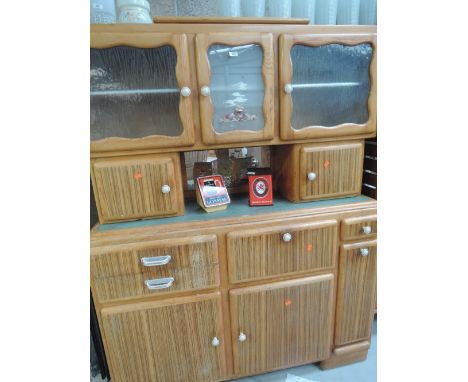 A vintage sideboard and drinks cabinet in a German style with nautical themes