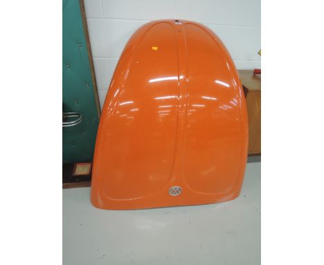 A vintage VW Beetle hood in classic burnt orange