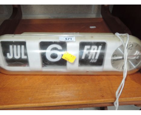 A vintage 80's style flip clock and calendar by Karlsson