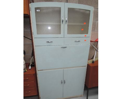 A vintage kitchenette or larder in baby blue