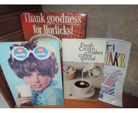 A selection of vintage card and plated advertisement signs for Horlicks Milk Coffee etc