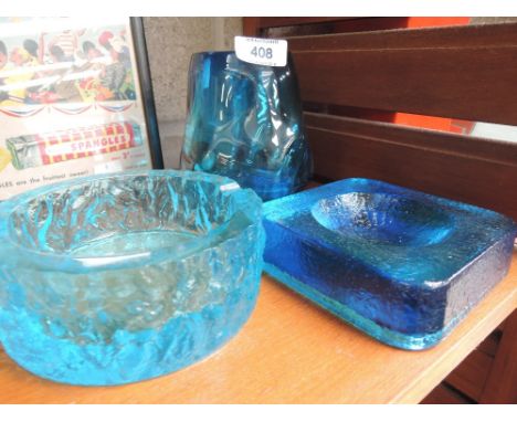 A selection of vintage king fisher blue glass in a white friars design