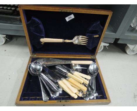 A selection of vintage cutlery and table wares