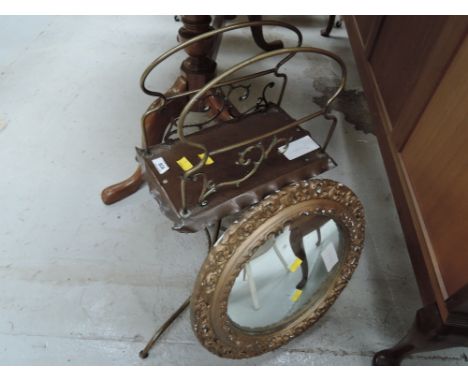 A vintage brass and copper magazine rack and a gilt plaster mirror