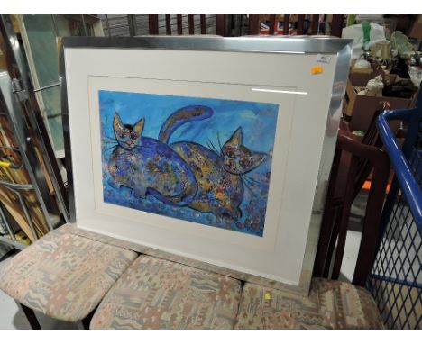A modern framed print in a moscaic style, cat interest