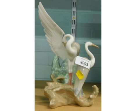 A Nao stork figure group, 25cm high.