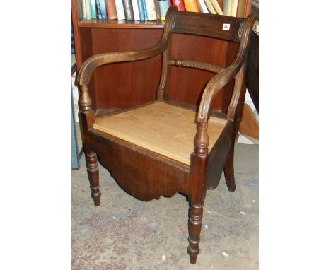 19th c. mahogany elbow chair commode with rope-twist bar back