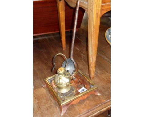 Unusual hanging brass spirit lamp, an Art Nouveau brass & copper trivet, and a copper ladle