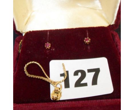 Pair of gold & ruby stud earrings