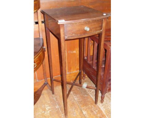 Small bow-fronted mahogany side-table on square tapering legs