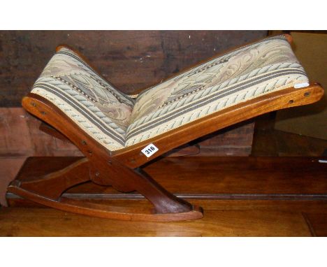 Upholstered mahogany rocking gout stool