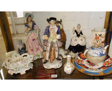 Shelf of assorted china including figurines, Imari plate etc