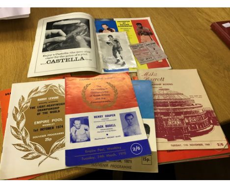 A collection of boxing programmes to inc: Ali v Cooper: 21st May 1966 with ticket and signed photograph of Cooper; Cooper v P