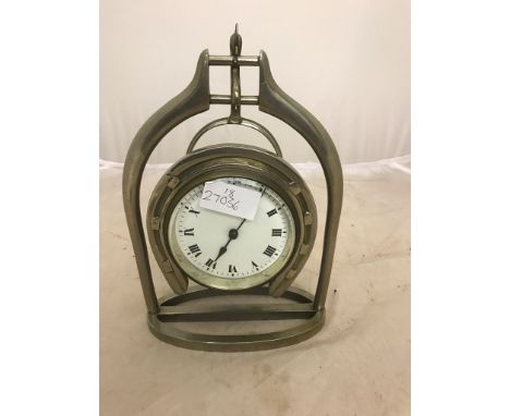 A silver-plated horseshoe mantel clock