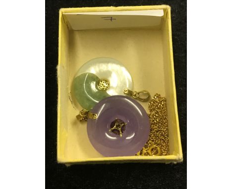 Jade pendants; together with a 9ct chain