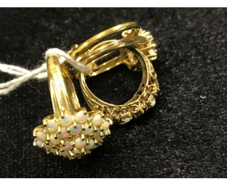 Four gold opal rings