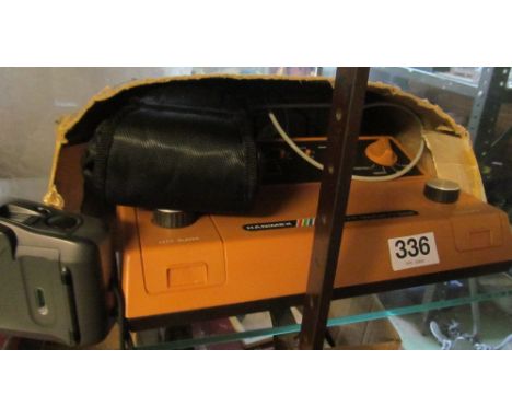 A Hanimax model 7771 game and a camera