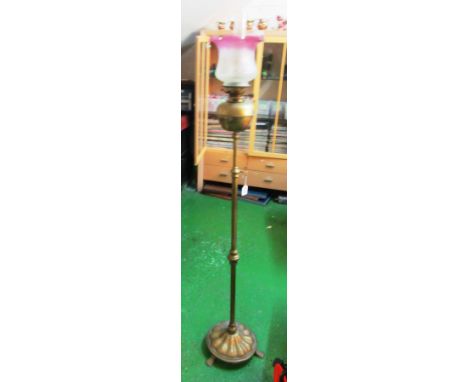 A Victorian oil style brass standard lamp with pink etched glass