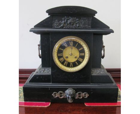 A Victorian large black slate mantel clock with gilt panel of cherubs and other details
