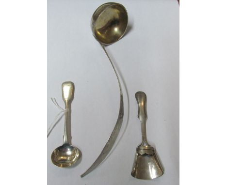 An Arabic white metal ladle, Dutch caddy spoon and Exeter silver salt spoon