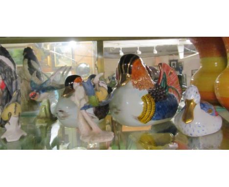 A Goebel budgie, woodpecker and various other bird ornaments